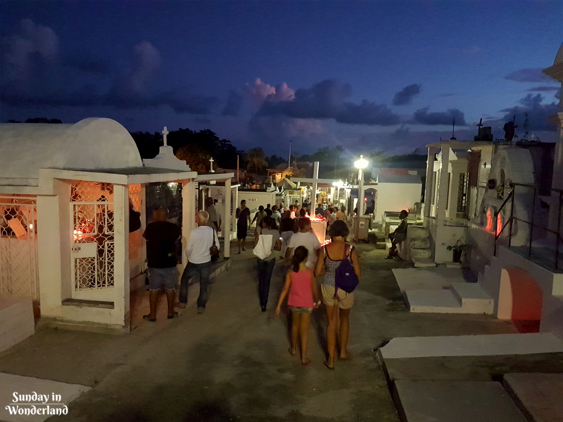 The lively crowd on the cemetery on All Saints' Day in Guadeloupe - Sunday in Wonderland Blog
