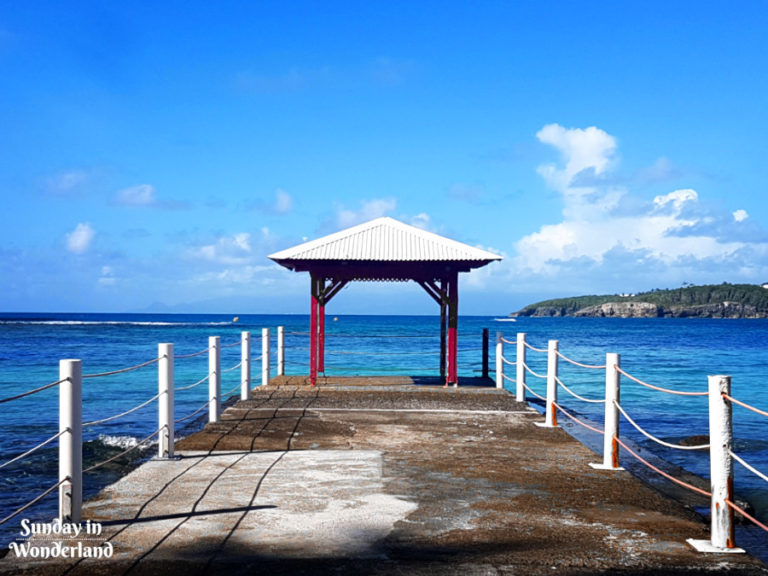 A pier over the Caribbean Sea - Best Caribbean Travel Blogs to follow and to help you plan your trip to the Caribbean