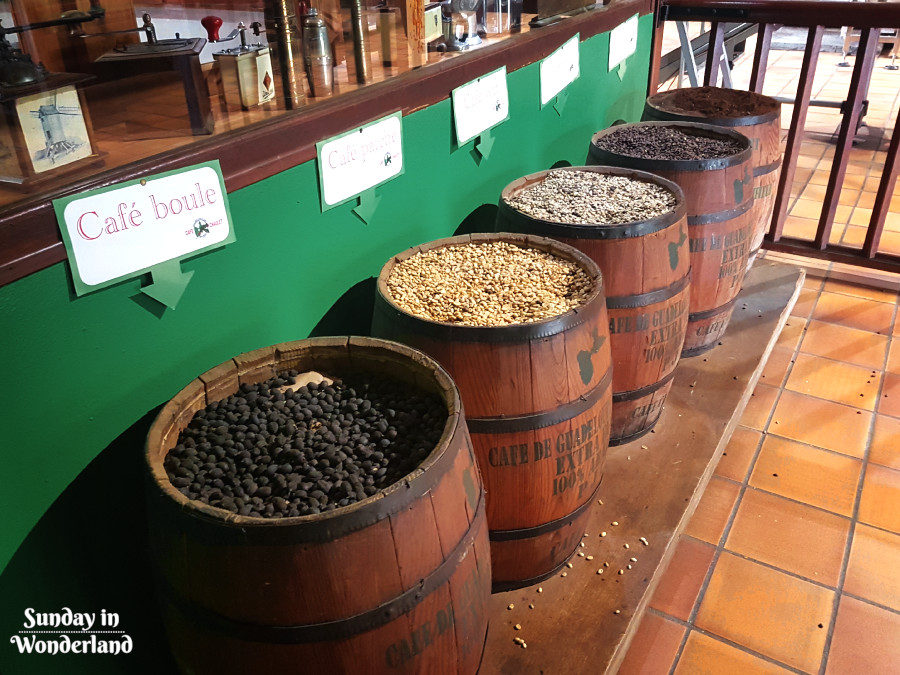Barrels with coffee beans in different steps of productions process - Coffee Museum in Guadeloupe - Sunday In Wodnerland Travel Blog