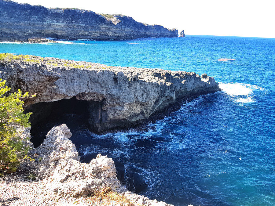 A deep grotto seen from the cliff - Porte d'Enfer in Guadeloupe