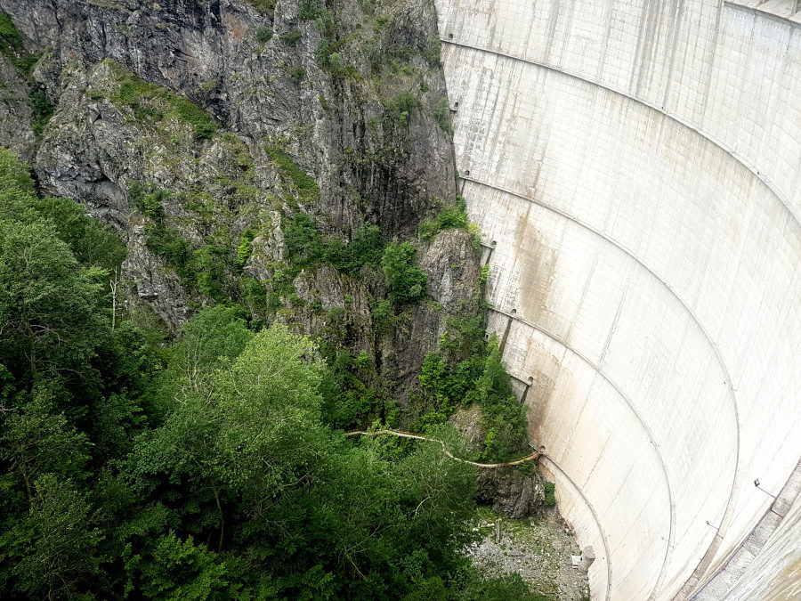 Looking down from the dam on Vidraru Lake on the Transfăgărășan road tri