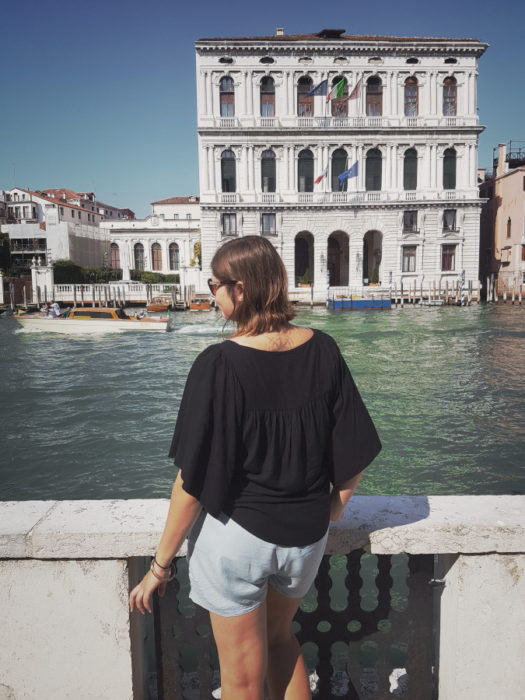 Standing in front of Canal Grande in Venice, Italy - Venezia