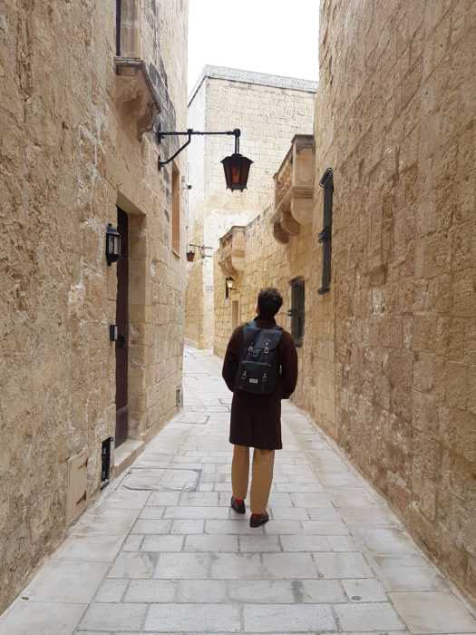 A man wandering in the streets of Mdina