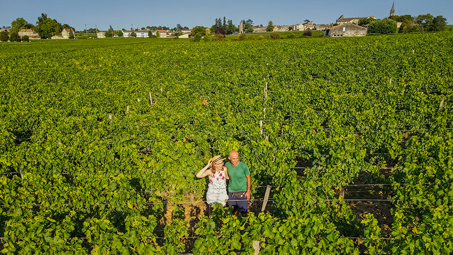 Two people in the French vineyard near Saint Emilion
