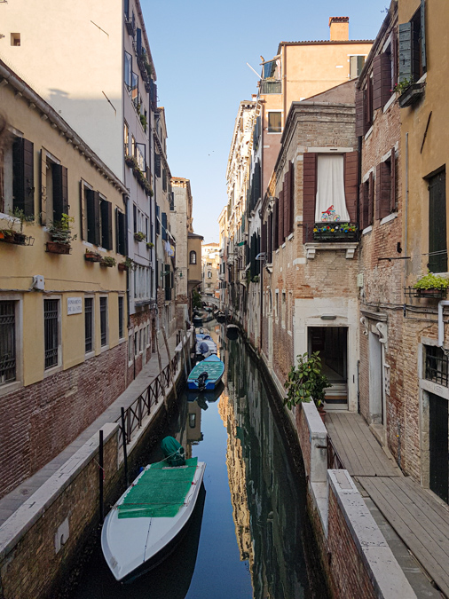 The narrow canal in Venice