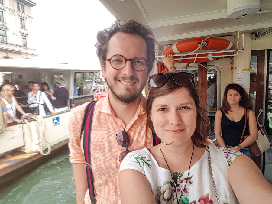 A couple on the Vaporetto boat in Venice - how to get around in Venice, Italy?
