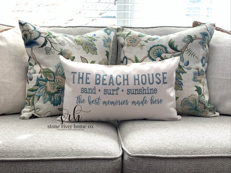 The beach house pillow quote
