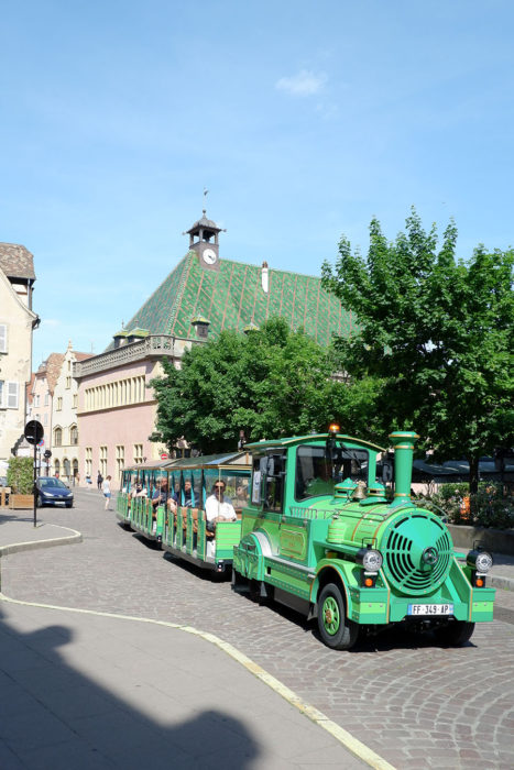 Green train in Colmar