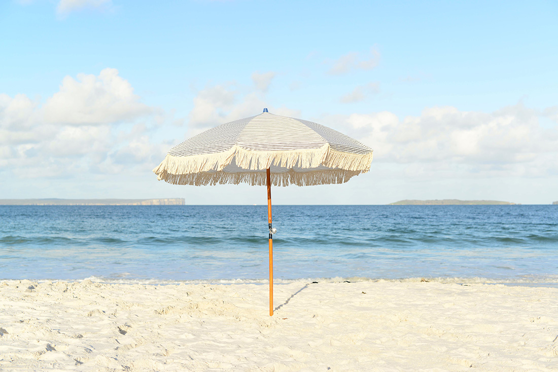 Fun short and inspiring beach quotes - umbrella on the beach